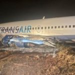 Boeing 737 plane carrying 73 passengers skids off runway as wing bursts into flames at Dakar airport in Senegal