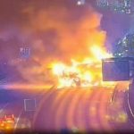 M25 closed in both directions after lorry catches fire in middle of road