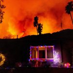 Some homeowners were defying evacuation orders in Mandeville Canyon.