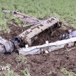 Lucky escape as part from fighter jet lands in village field