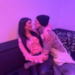 Kourtney Kardashian and Travis Barker Share Passionate New Year’s Kiss