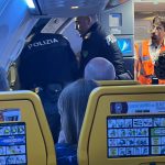 Moment Brit passenger is dragged off Ryanair flight to Corfu after ‘on-board brawl’ diverted plane 600 miles to Italy