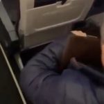 Dramatic moment furious plane passenger SLAPS ‘thief’ after watching him ‘steal from bag in overhead cabin’