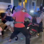 Shocking moment mob beats up Brit tourist after he ‘ploughs into woman while pulling wheelie on motorbike’ in Thailand