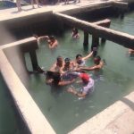 Boy, 14, nearly loses his hand in brutal shark attack at notorious backstreet aquarium where tourists SWIM with beasts