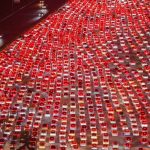 Watch as miles-long traffic jam brings 36-lane highway in China to halt as 10MILLION cars hit roads for national holiday