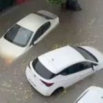Spain weather red alert as gales and floods smash holiday resorts while vid shows bystander cheat death as tree topples