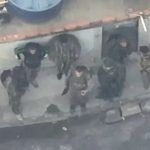 How battle of Rio unfolded as footage shows armed-to-the-teeth cartel commandos fleeing cops through bloodsoaked streets