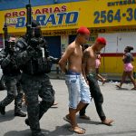 Rio cops ‘DECAPITATED teen gangster & hung head from tree’ in barbaric warning to Favela drug cartels as slum war erupts