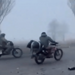 Putin’s Mad Max troops ride through fog on bikes, in clapped-out hatchback & in armoured cars as they encircle key city