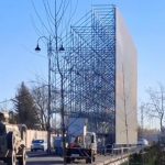 Ukrainian embassy blocked from Putin’s view by giant BILLBOARD hastily erected by toadying president for tyrant’s visit