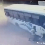 Horror moment out-of-control bus misses parked cyclist by just inches as it crashes into building