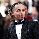 Rapper, 26, who ‘kidnapped and beat teen fan who tried to take a photo of him’ charged after cops raided star’s home