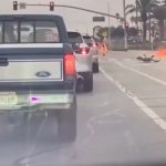 Shocking moment dirt bike EXPLODES in fireball leaving teen rider on fire in horrific sideswipe crash