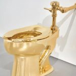 Solid gold toilet ‘artwork’ created by infamous artist who taped a banana to a wall sells for £9.5m – and it works