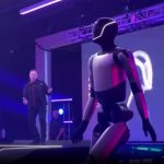 Elon Musk dances with a robot after biggest pay award in history paves way for him to become world’s first TRILLIONAIRE