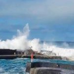 Brit holiday hotspot on ‘red alert’ as monster 15ft waves batter island after tourists swept out to sea & three killed