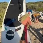 Shocking moment great white shark drags surfer beneath the waves taking chunk out of his board in terrifying attack