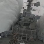 Stunning moment Nato submarine torpedoes frigate in exercise as ship erupts into the air & containers fall off