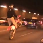 Louvre heist suspect is ex-museum guard and joyriding biker influencer who was filmed popping wheelies on Champs Elysee