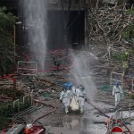 Hong Kong fire death toll rises to 146 with 150 still missing as search of scorched towers set to take up to four weeks