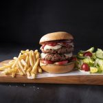 Diner, 22, fights for life after trying to swallow an entire burger whole ‘for a joke’ leaving him in intensive care