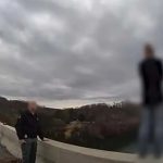 Heartstopping moment hero cop stops distraught woman from leaping off bridge on Boxing Day