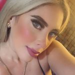 Woman shot dead by car of armed men while attending funeral of star footballer who had also been gunned down