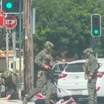 Heavily armed cops ram car in Sydney ‘and arrest five’ with city on edge in wake of Bondi terror attack