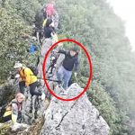 Horror moment tourist plunges off 130ft cliff while trying to take a selfie as onlookers scream in terror