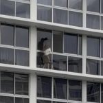 Heart-stopping moment homeowner cleans windows on tiny 16th-floor window ledge