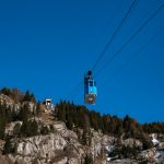 Two injured and more than 100 stranded as cable car slams into barrier at 9,000ft summit in Italy