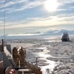 Incredible moment stranded 200-passenger Arctic cruise liner is saved by US icebreaker that carved path for frozen ship