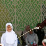 Brutal moment woman FAINTS after being lashed 140 times in agonising Sharia punishment for having sex outside marriage