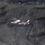 Missing tourist helicopter found stranded near active volcano crater spewing fumes & hampering rescue mission in Japan