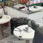 Moment woman brandishes 30cm kitchen knife & is tackled by cops after her payment failed at Hong Kong noodle shop