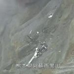 Horror pic shows helicopter wreck inside active volcano crater near cliff edge after chopper crashed as three missing