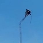 Horror moment transmission tower collapses with two workers strapped to the top sending them falling to their deaths