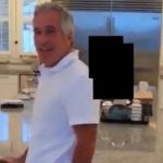 Disturbing new footage shows Epstein laughing as he chases young women around kitchen on notorious paedo island
