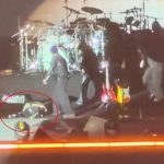Shocking moment singer collapses on stage at music festival after belting out hit record & is rushed to hospital