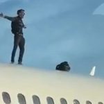 Watch shocking moment man climbs on airplane’s roof at Spanish holiday hotspot airport causing two-hour flight delay